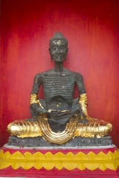 Image of Buddha statue of starving symbol at Thailand