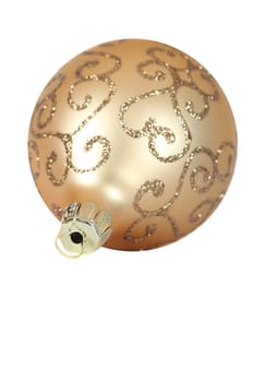 Ornate gold christmas ball on a white background
