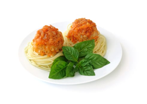 Meatballs (noisettes) with nests of spaghetti with basil isolated