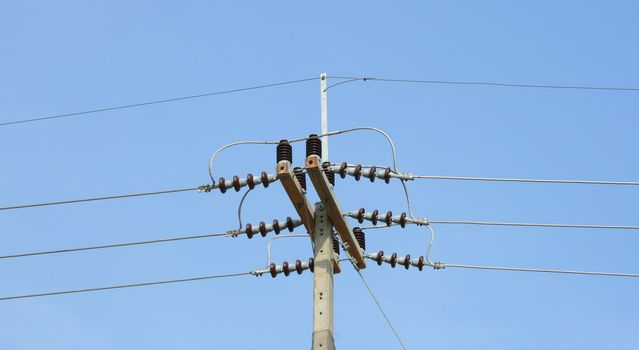 Electric Cable and wires against a blue sky