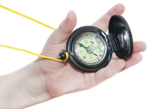 Compass in a hand on a white background