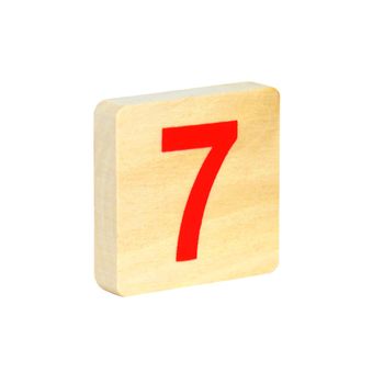 Figure seven on a wooden square on a white background
