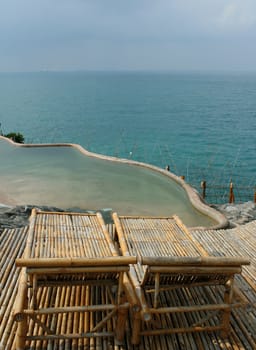 Bamboo chair on tropical coast