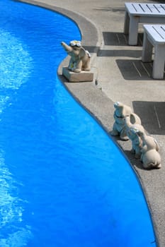 Blue water in swimming pool