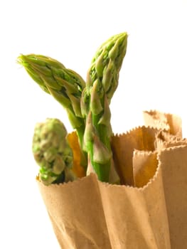 asparagus in brown paper bag