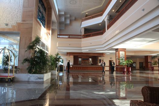 Modern hotel lobby with marble floor