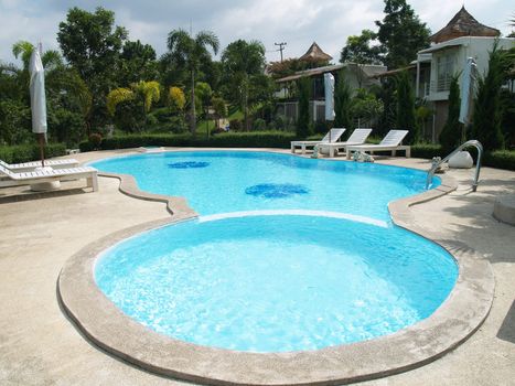 Blue water in swimming pool