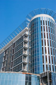 building with blue windows during construction