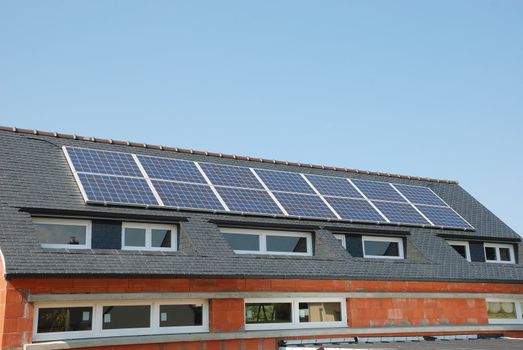 House with solar panels on roof
