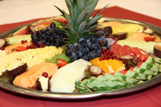  Plate of assorted fruit, cut fruit - served appetizing