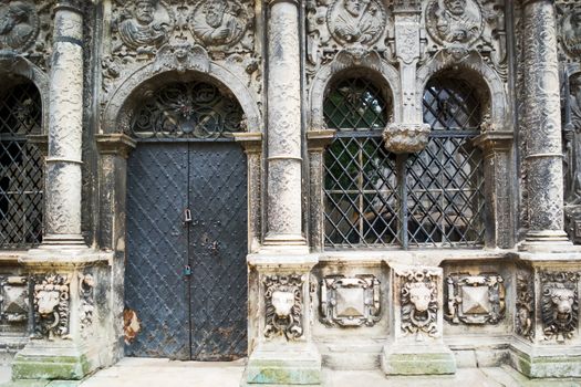 facade of an old church adorned with a bas-relief