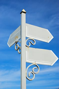 old metal pointer with empty signs