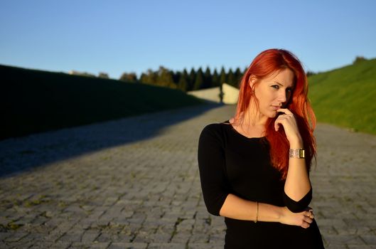 Redhead girl posing