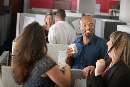 Employees enjoying cup of coffee during break