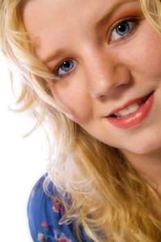 Studio portrait of a blond young lady looking average