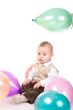 small boy with balloons