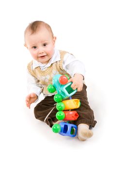 small boy with toy in hands