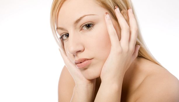 Studio portrait of a young blond woman in a spa