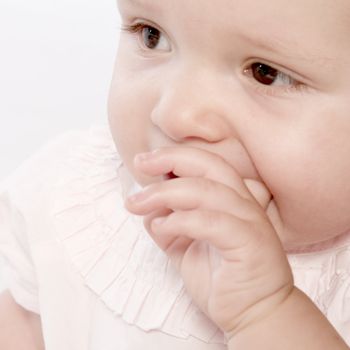 little children portraits taken in the studio on a white background