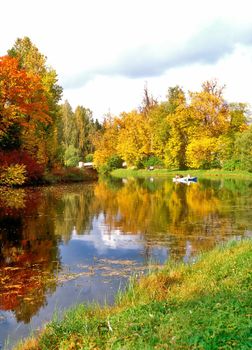 Picturesque pond in autumn day