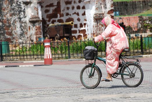 Woman riding her bike