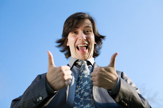 happy businessman shows that everything is great