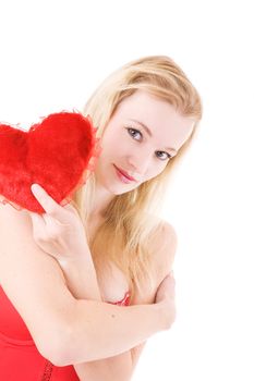 pretty blond girl with a red pillow heart