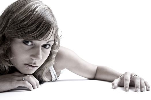 Studio portrait of a teenage model on the floor