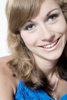 Studio portrait of a teenage model smiling