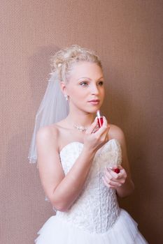 blond bride with a lipstick