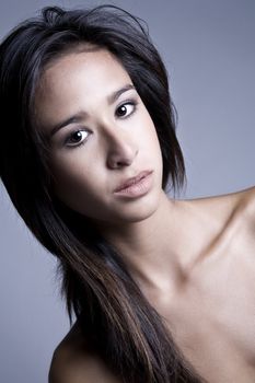 Classical studio portrait of a beautiful, mixed race, vietnamese girl 