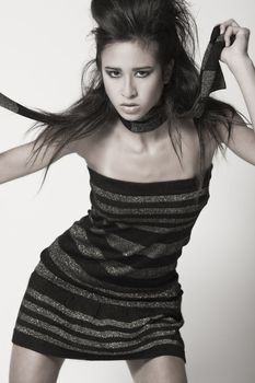 Studio portrait of a beautiful mixed race, vietnamese girl in your face