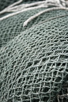 Close up of fishing net found in a fishing village.