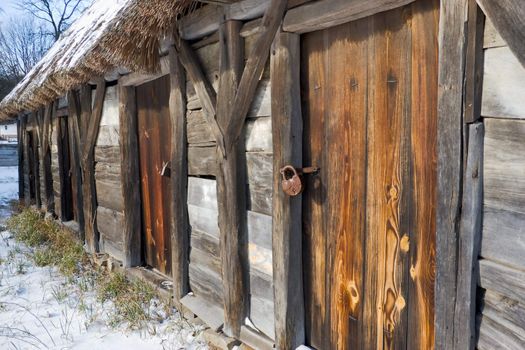 Authentic vintage wooden door on original log cabin