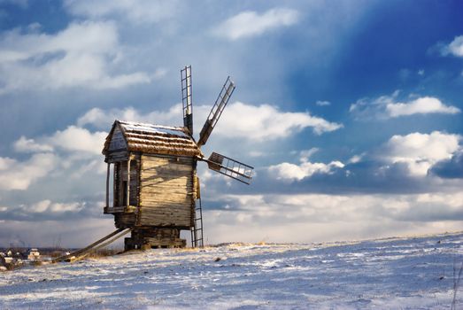 Old wooden windmills at Pirogovo ethnographic museum, near Kiev, Ukraine 
