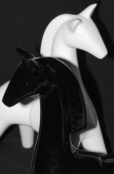 black and white ceramic horses
