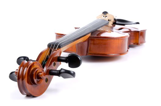 Side view of violin on white background.