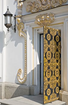 Old church entrance door with iron ornaments