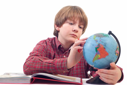 a young boy with the globe on a white background