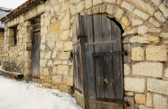 Authentic vintage wooden door on original log cabin