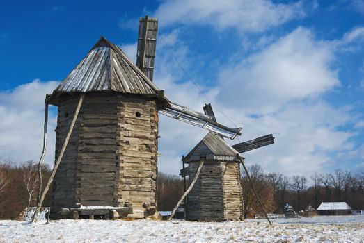 Old wooden windmills at Pirogovo ethnographic museum, near Kiev, Ukraine 