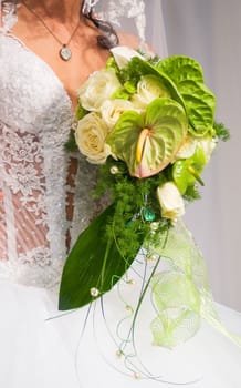 Bride with bouquet and grasses
