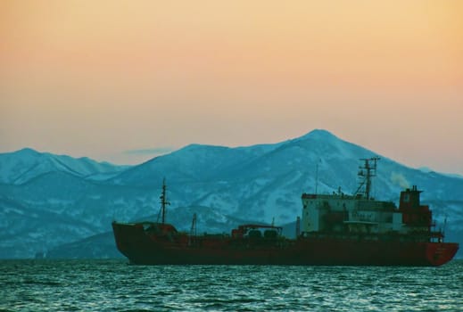 The ship in the sea near to coast