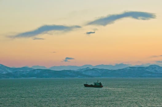 The ship in the sea near to coast