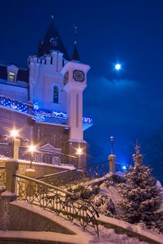 City night scene with lights and snow 