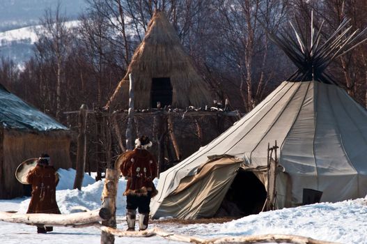 Aboriginals of the north coming into a hut