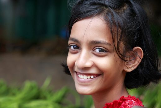 KALATURA, SRI LANKA 09 APRIL 2011: Casual portrait of the nice girl in the street city Kalatura 9 April 2011 on Sri Lanka
