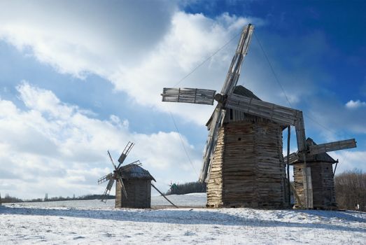 Old wooden windmills at Pirogovo ethnographic museum, near Kiev, Ukraine 