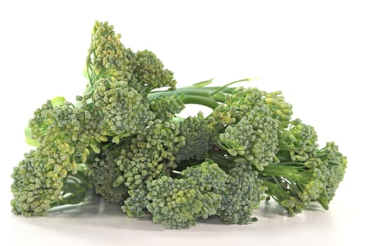 a bundle of green Spargoli on a white background