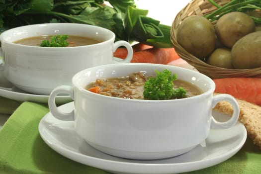 Lentil stew with potatoes, carrots and parsley